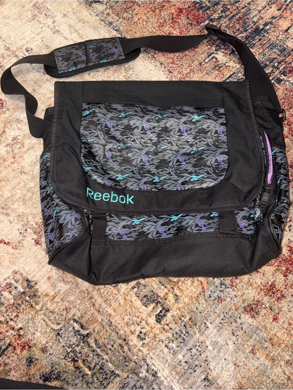 Reebok Black Messenger Bag with Teal and Purple Pattern